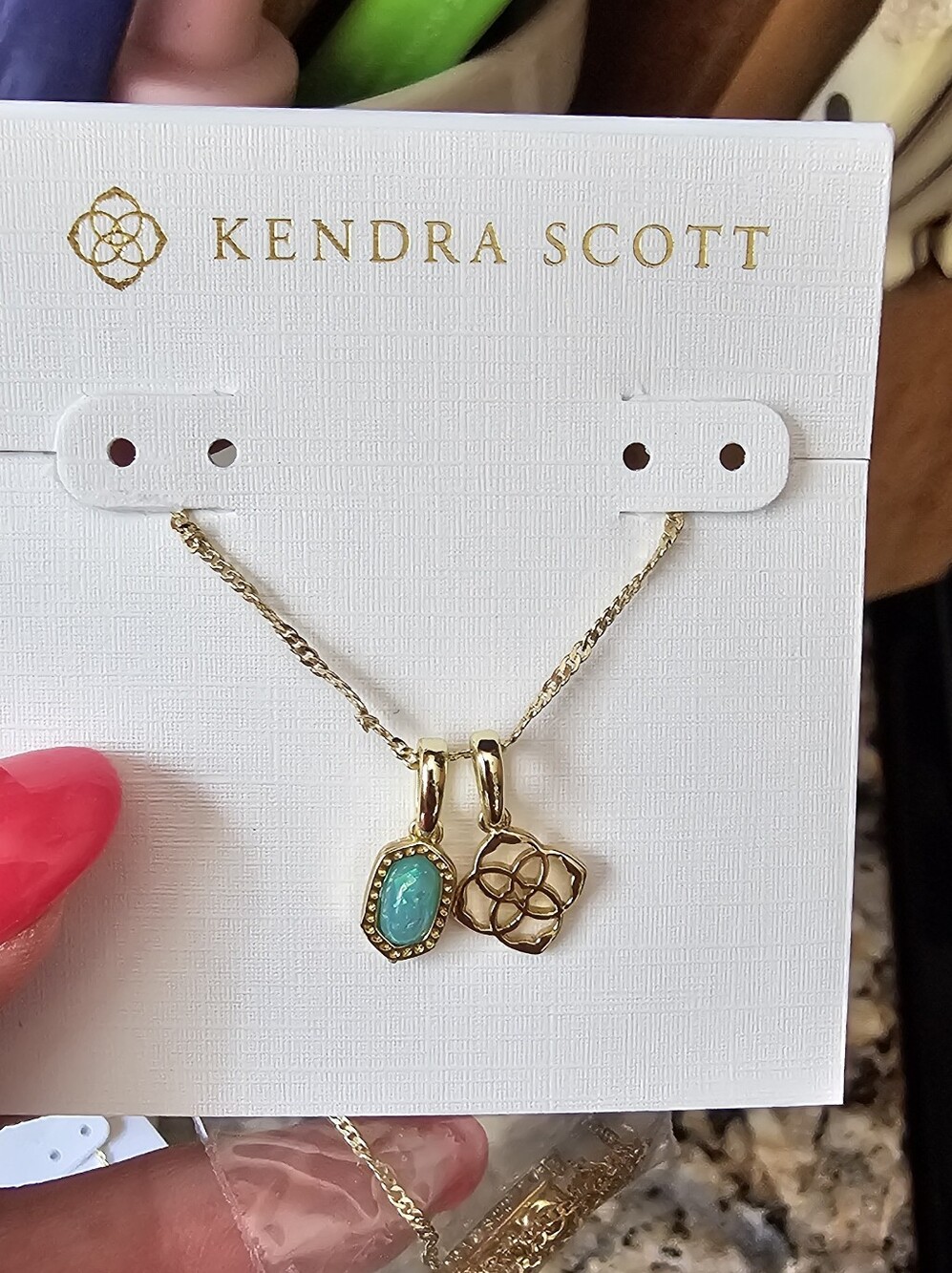Kendra Scott Gold Necklace with Turquoise Charm and Gold Floral Pendant